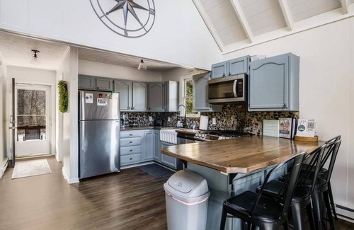 Shenandoah House | Beautiful Secluded riverfront home with double decks Firepit, Hot Tub, Kayaks