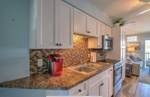 Saint James City Condo | Beautiful SJC Island Condo w/heated pool on main canal, great fishing!