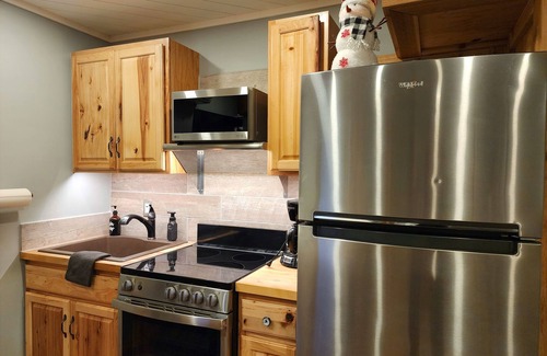 Bellaire Condo | Beautiful sleeps 4 Schuss Village Golf Course, pool, boat parking, Nearby Lakes