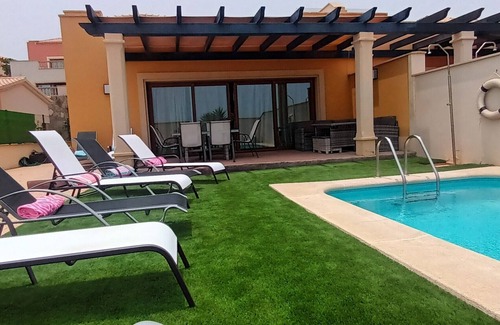 Caleta de Fuste Villa | Beautiful, spacious villa, heated pool, sleeps eight, with quality furnishings