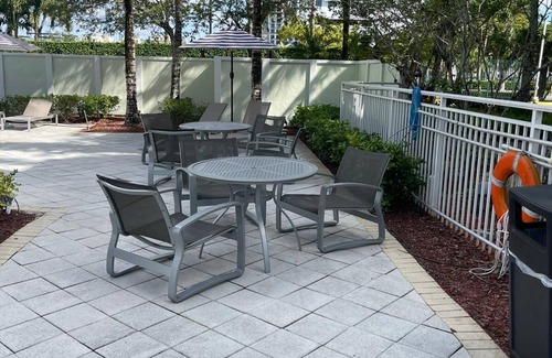 Doral Apartment | Beautiful studio with King bed + sofa bed, dining area, patio, kitchen, bathroom