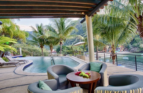 Boca de Tomatlan Apartment | Beautiful suite with two king size beds, with a large terrace with beach view