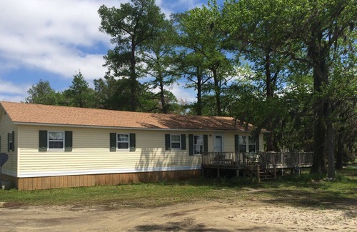 Columbia House | Beautiful sunsets, Cypress trees and Spanish moss retreat