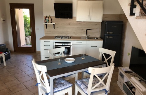 Case Peschiera-Lu Fraili House | Beautiful terraced house with pool, terrace and sea view