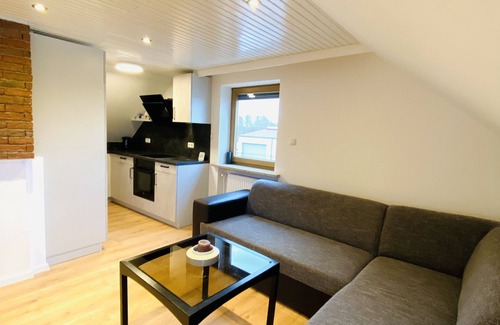 Haunstetten-Sud Apartment | Beautiful top floor apartment with loft character