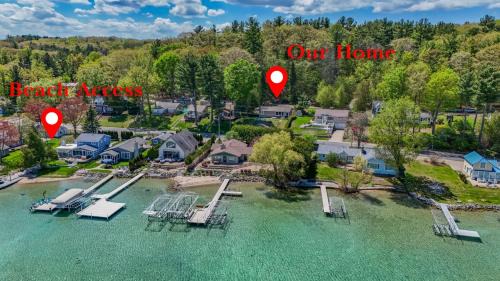 Rapid City House | Beautiful Torch Lake House with Beach Access home