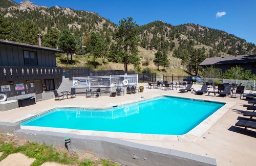 Estes Park Condo | Beautiful Two Person Suite on the Banks of Fall River