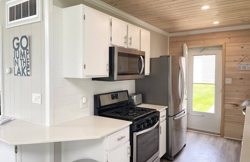 Onekama House | Beautiful updated home with 100’ on Portage Lake - 20 minutes to Arcadia Bluffs