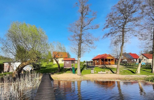 Barczewo House | Beautiful vacation country house with large garden directly on the water.