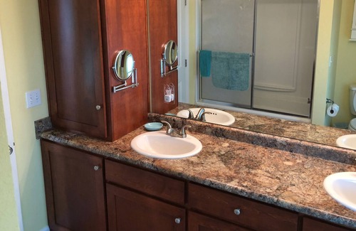 Panacea House | Beautiful vacation house on a canal with outdoor pool & short distance to beach!