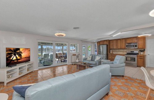Port Charlotte House | Beautiful Waterfront House with Heated Pool and Fishing Dock