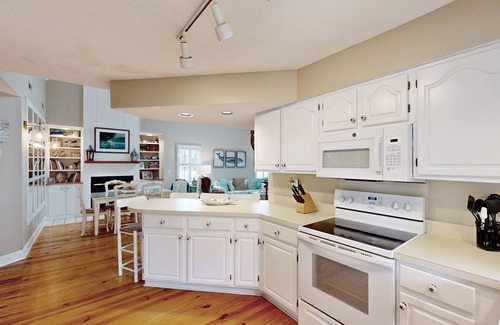 Ocean Ridge Condo | Beautiful waterfront home with fairway view & private dock