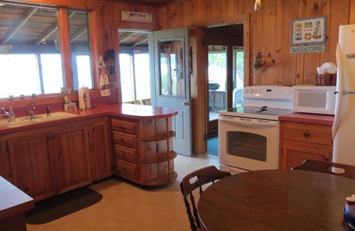 Onekama Cottage | Beautiful Waterfront Family-Friendly Rustic Cottage on Portage Lake-Onekama, MI.