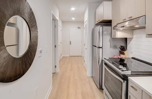 Buzzard Point Apartment | Beautiful Waterfront 1BR w Full Kitchen + Gym | nr Rivers