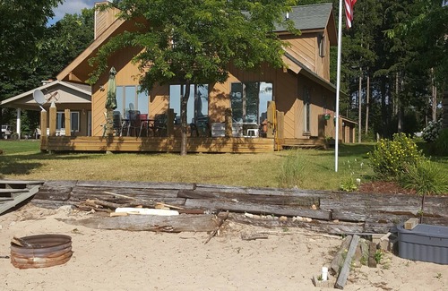 Lake City Ski Chalet | Beautifull beachfront Chalet with large deck facing the water. 50ft from water