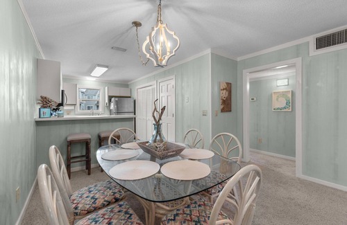 Ocean Sands Condo | Beautifully decorated condo in Corolla with community pool outside!
