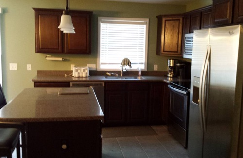 Frontier House | Beautifully Remodeled Lake Front House W/ Beach, Paddle Boat & Kayak. Sleeps 18+