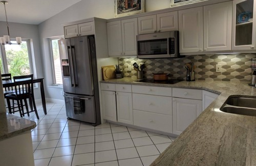 Naples Condo | Beautifully Remodeled Second Floor Falling Waters Condo 2 minutes to the Pool