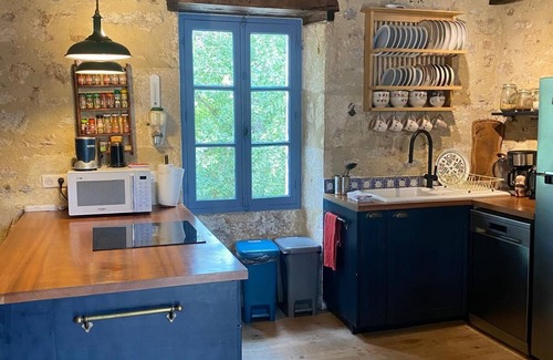 Touzac House | Beautifully renovated traditional riverside cottage, withnlarge private garden.