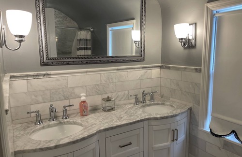 Rochester House | Beautifully renovated Brighton home on private inside corner lot.