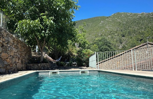 Roquebrun House | Beautifully restored wine grower’s house with pool in stunning riverside village