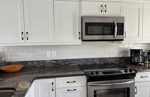 Spinnaker Beachhouses Villa | Beautifully updated villa! Walk to beach, pools, golf, amenity cards!