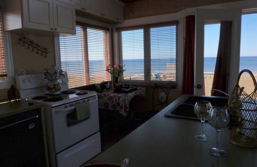 French Village Cottage | Beautiiful Oceanfront Chalet with Spectacular Sunsets & Beach