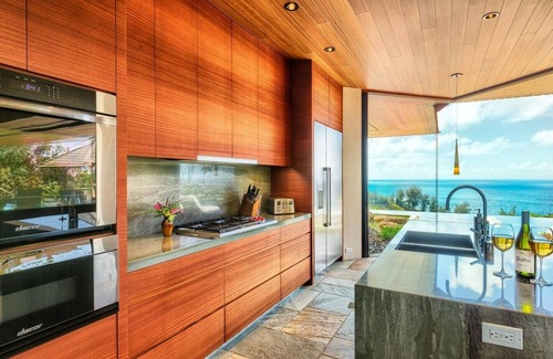 Kilauea House | Beauty and modernity meet in this standout oceanfront home perched above Secret Beach.
