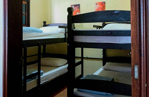 Itamambuca Cabin | Bed in shared room