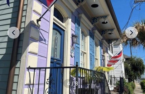 Treme House | bedroom and en suite bath in historic New Orleans home with pool & WiFi