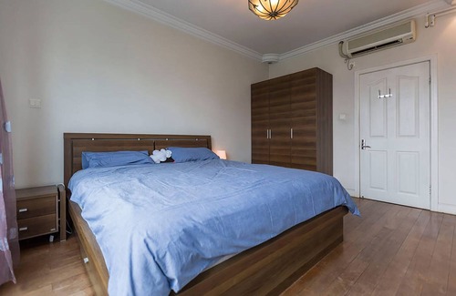 Shanghai Apartment | Bedroom with private bath and amazing city view
