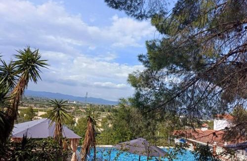 Lliria House | Bedroom with private bathroom and Two-Bedroom Family Suite in quiet forest country house 80m2 large swimming pool music town Lliria The garden and swimmingpool and garden are shared