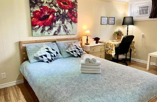 Stouffville House | Bedroom with private bathroom in Toronto
