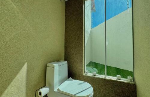 Barra do Jacuipe House | Bela acomodação em jacuipe com churrasqueira, piscina, mesa de sinuca e três quartos, dois sendo suítes! Além de muito espaço por toda a área!