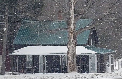 Malone House | Bela's Bungalow at Titus Mountain Family Ski Area and the Salmon River.