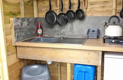Mount Hawke RV Rental | Bell tent with separate own kitchen pet friendly