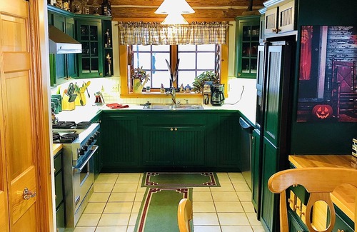 Central Lake Cabin | Bellaire Overlook Log Home on Beautiful 40 Acres with sunset views