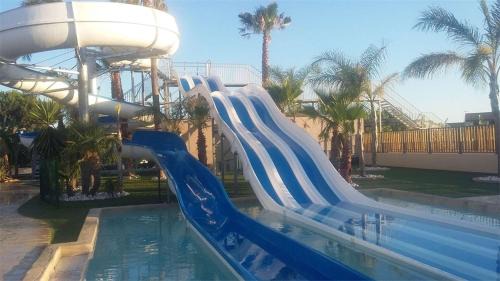 Portiragnes-Plage Villa | Belle villa d'angle spacieuse climatisée, de tout confort dans domaine PORTES DU SOLEIL, ACCES PISCINES PAYANT EN SUPPL - 3 chambres, 6 couchages, wifi, 400m de la mer LRPDSJ7