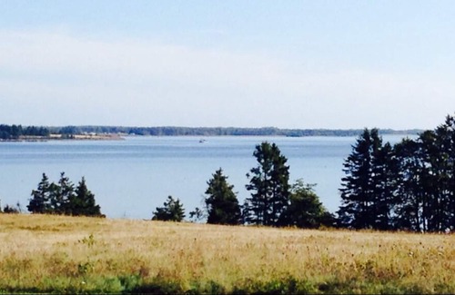 Murray Harbour Cottage | Belleview Beach House cottage with more than 1500 feet waterfront beach....