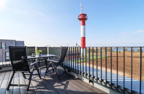 Marienleuchte Apartment | BeltBlick 11 – Ferienwohnung mit unverbautem Meerblick & Dachterrasse!