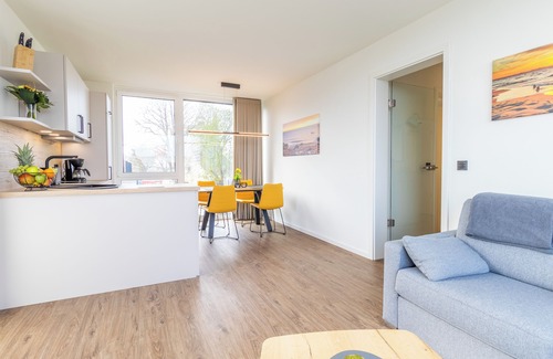 Marienleuchte Apartment | BeltBlick 24 - Roof terrace. Sea view. Sauna. Design.
