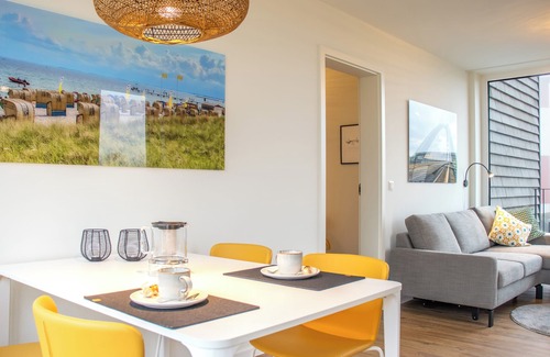Marienleuchte Apartment | BeltBlick 30 - roof terrace. Sauna. Sea view. Family-friendly.