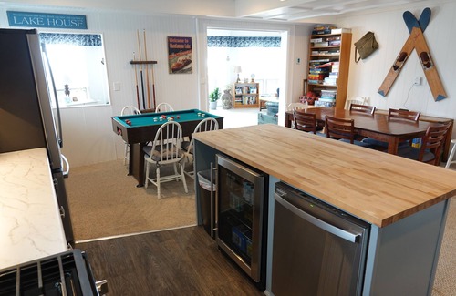 Bemus Point House | Bemus Point lakefront family home with deck, dock, boat slip, sunroom with view