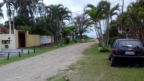 Jardim Neptunia House | Bertioga pé na areia com piscina no Cantão do Indaiá
