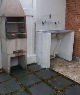 Jardim Neptunia House | Bertioga pé na areia com piscina no Cantão do Indaiá