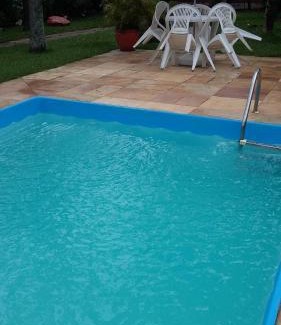 Jardim Neptunia House | Bertioga pé na areia com piscina no Cantão do Indaiá