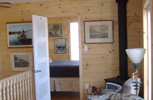 The Battery House | BEST CITY VIEWS, COTTAGE WITH LARGE DECK, ON THE HARBOUR. MININUM 31 DAY STAY