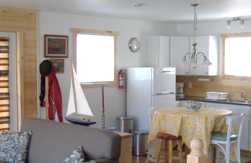 The Battery House | BEST CITY VIEWS, COTTAGE WITH LARGE DECK, ON THE HARBOUR. MININUM 31 DAY STAY