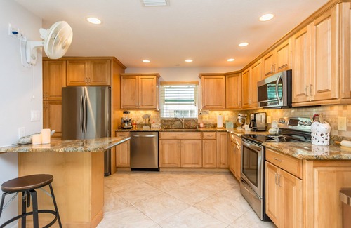 Garden Isles House | Best Family Retreat: Heated Pool/Tiki Hut/Minutes Away From White, Sandy Beaches