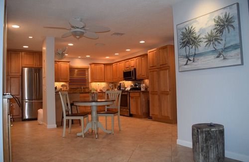 Garden Isles House | Best Family Retreat: Heated Pool/Tiki Hut/Minutes Away From White, Sandy Beaches